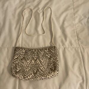 Vanessa for Fashion Imports evening bag, white satin with silver beads.